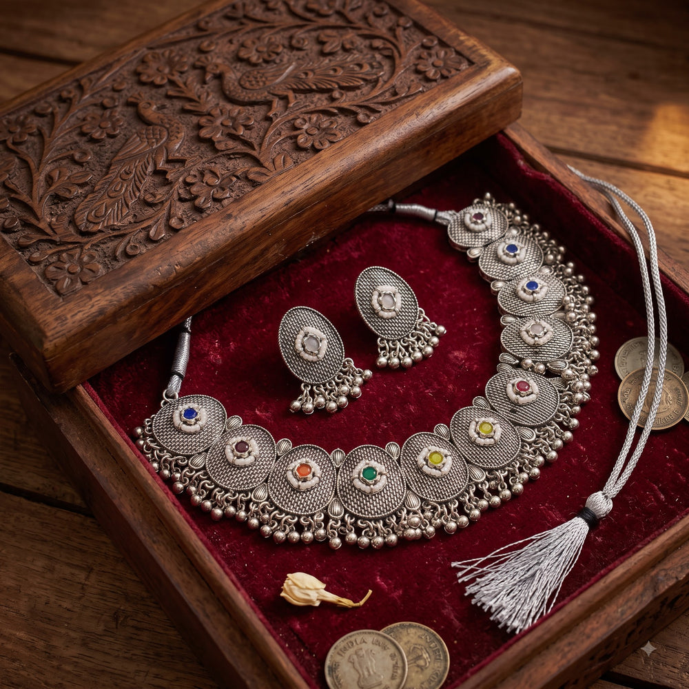 Oxidised silver-tone multicolour choker necklace and matching earrings in a carved wooden box