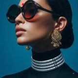 Model styling the silver choker necklace with black outfit