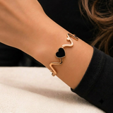 Elegant Rose Gold Black Heart & Wave Bracelet