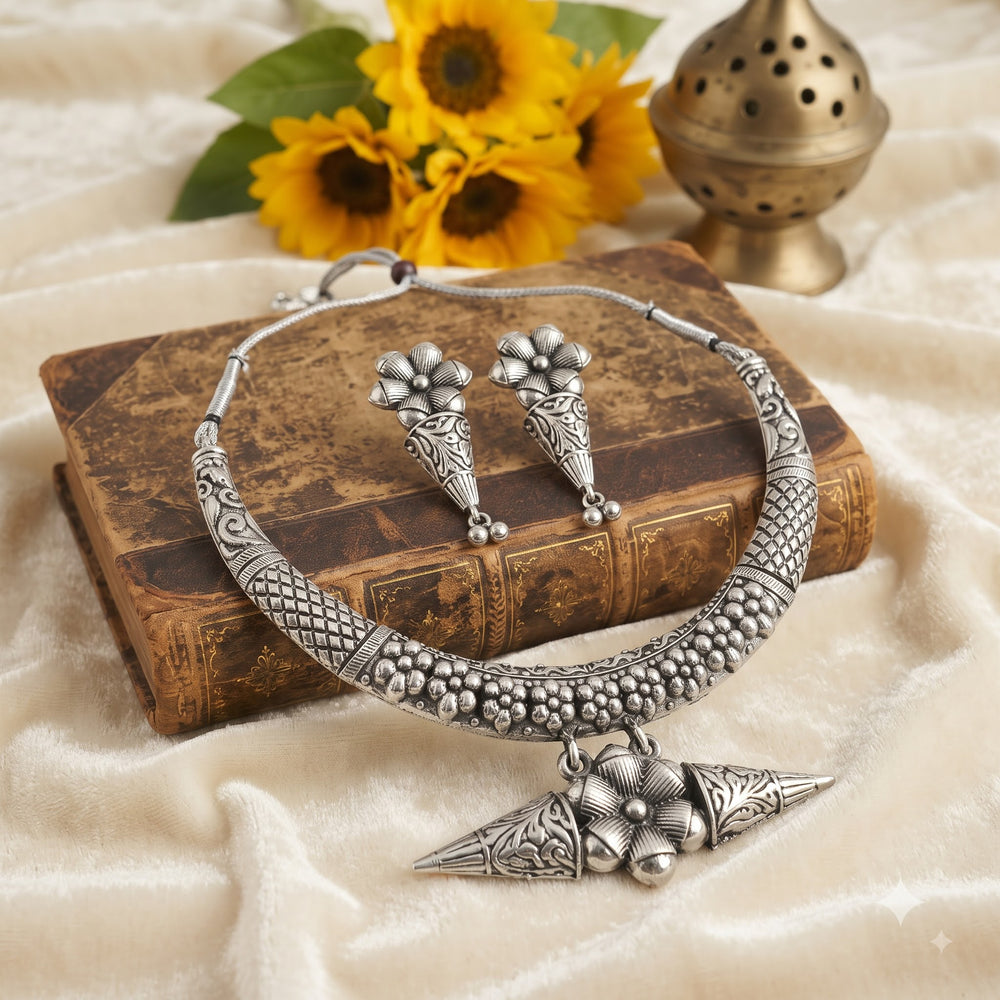 Oxidised hasli collar necklace with floral pendant and matching earrings