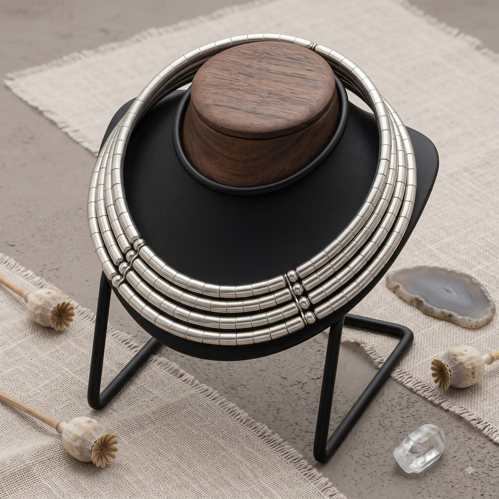 Layered ribbed choker necklace on a display bust